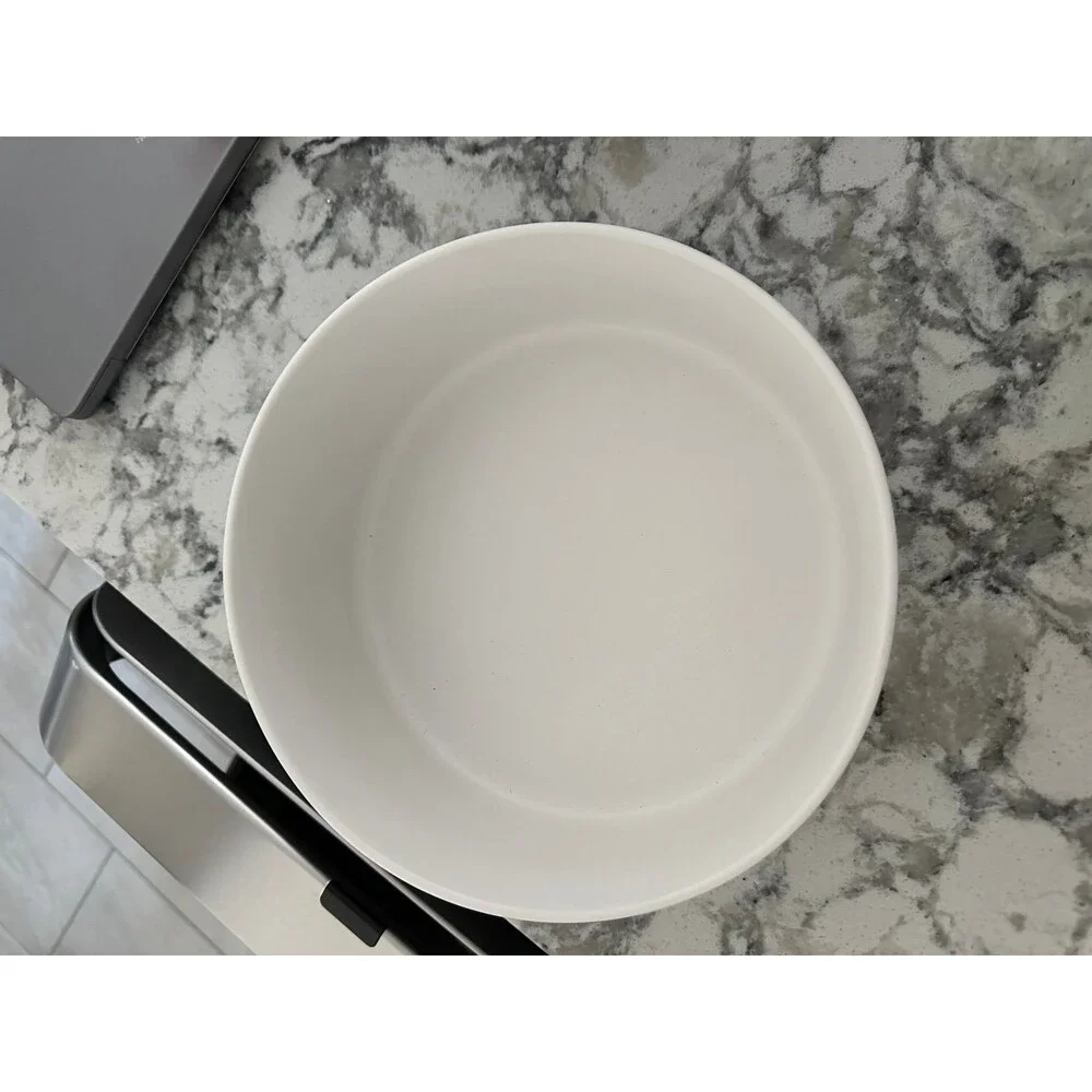 Brand new white ceramic dog bowl